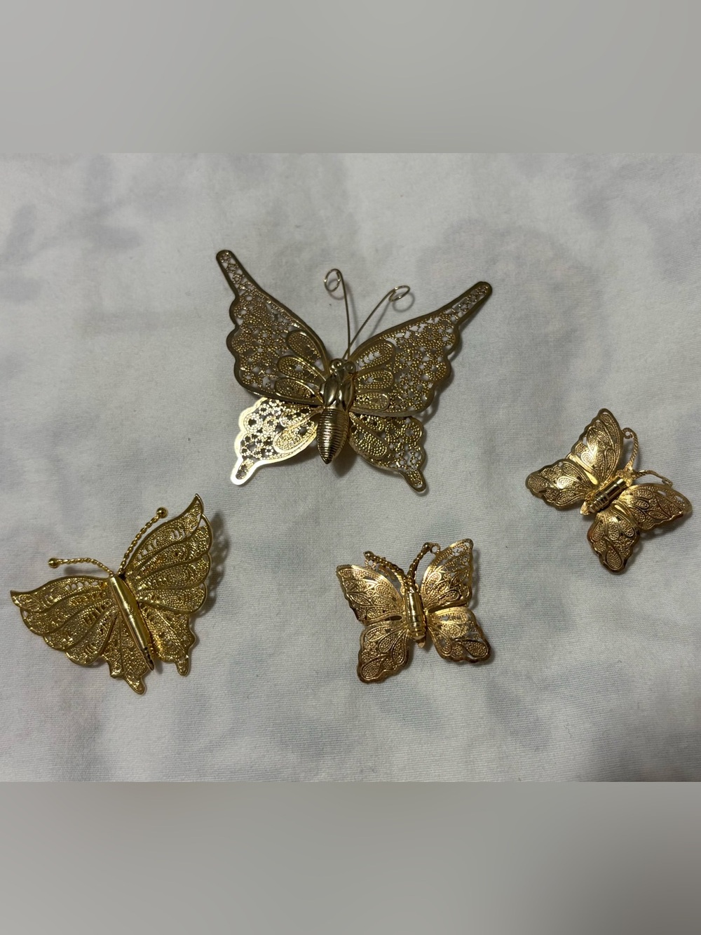 Lot of 4 gold tone butterfly pins